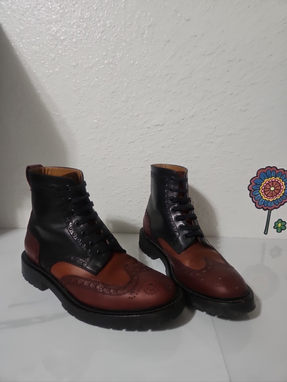 Burberry Barkeston tricolor leather combat boots featuring a wingtip brogue toe